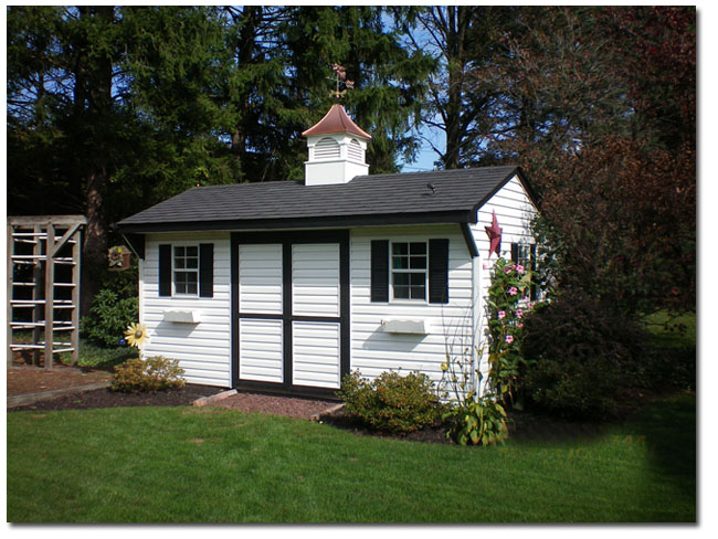 angel weathervane with hartford cupola on a shed