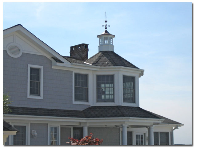 windowed cupola with finial on a sun room