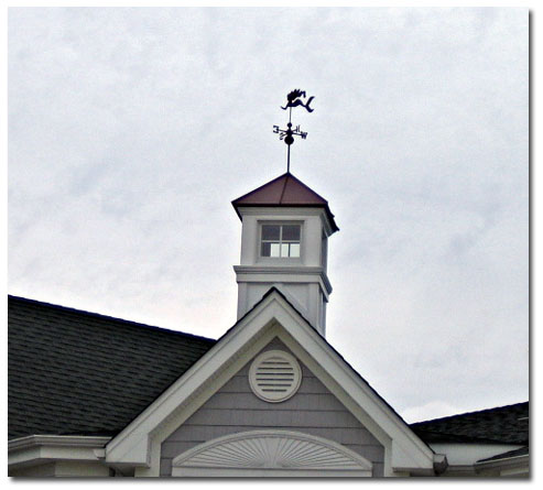 custom cupola with mermaid weathervane on large home close up 