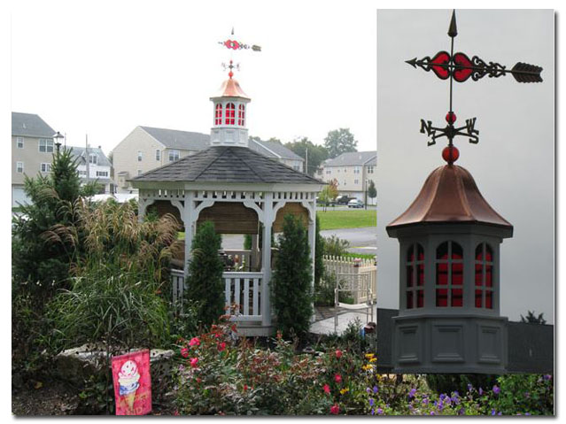 red glass cupola with arrow weathervane on a gazebo