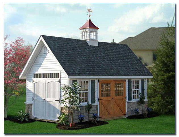 fairfield cupola with humming bird weathervane on a shed